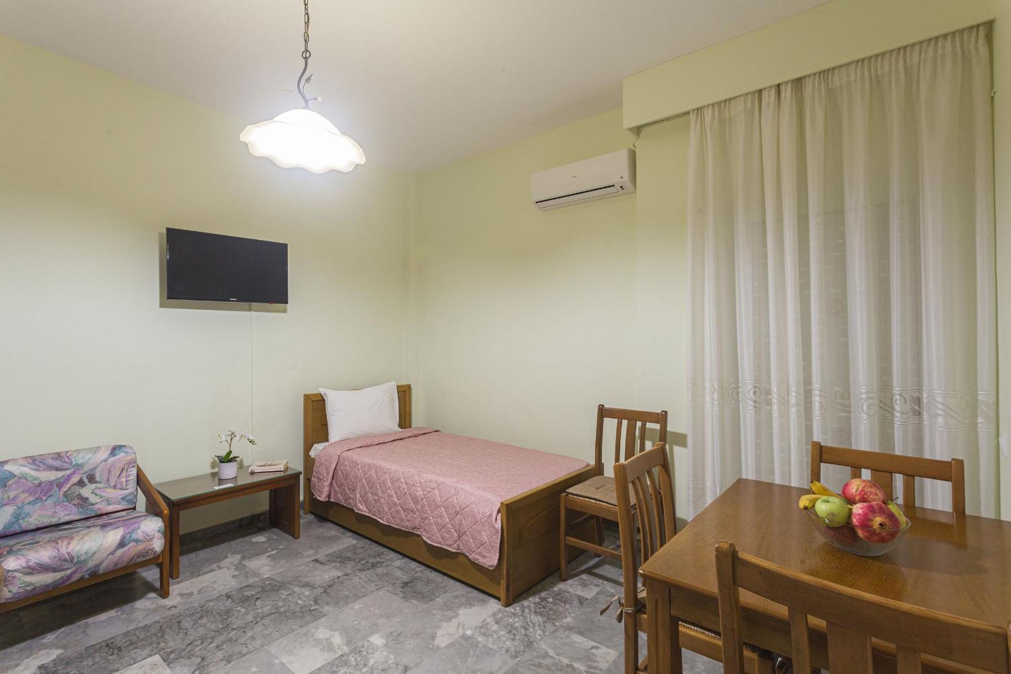 Remvi Hotel - Apartments Stoúpa Oda fotoğraf